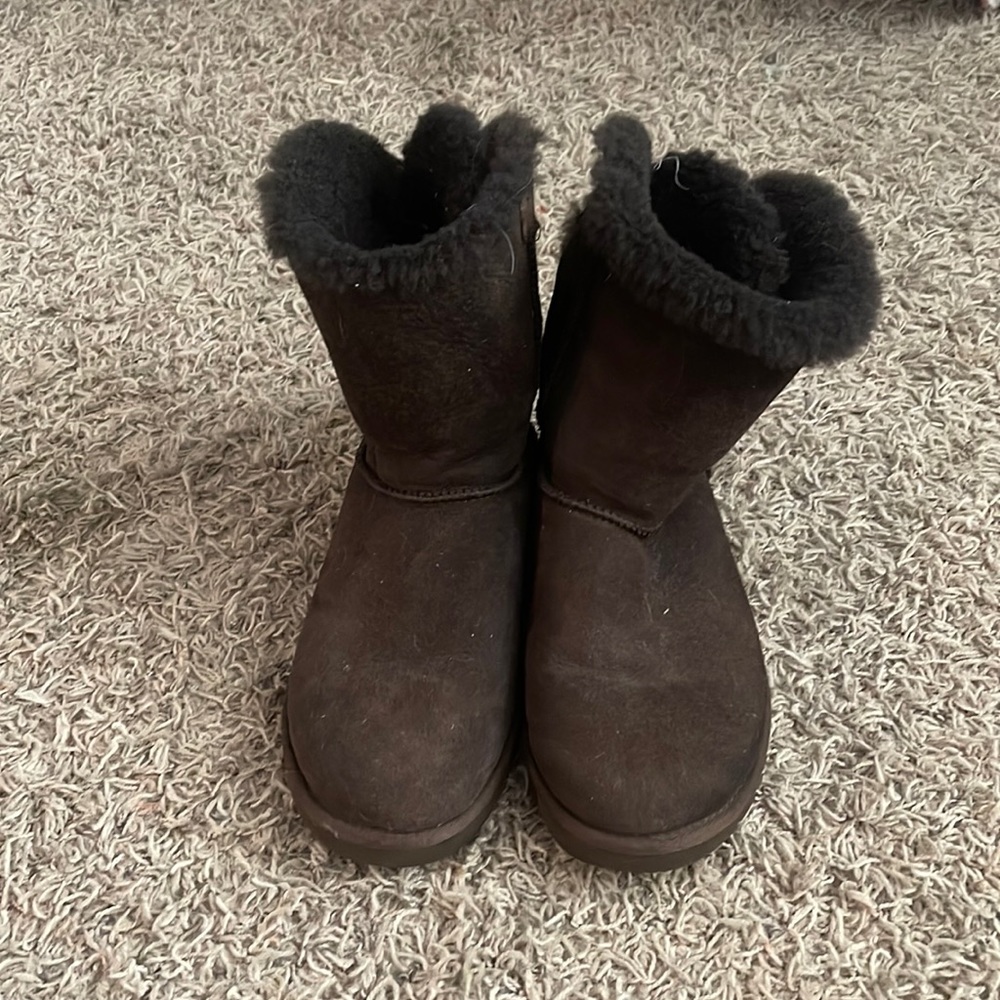Brown ugg boots with ties in the back